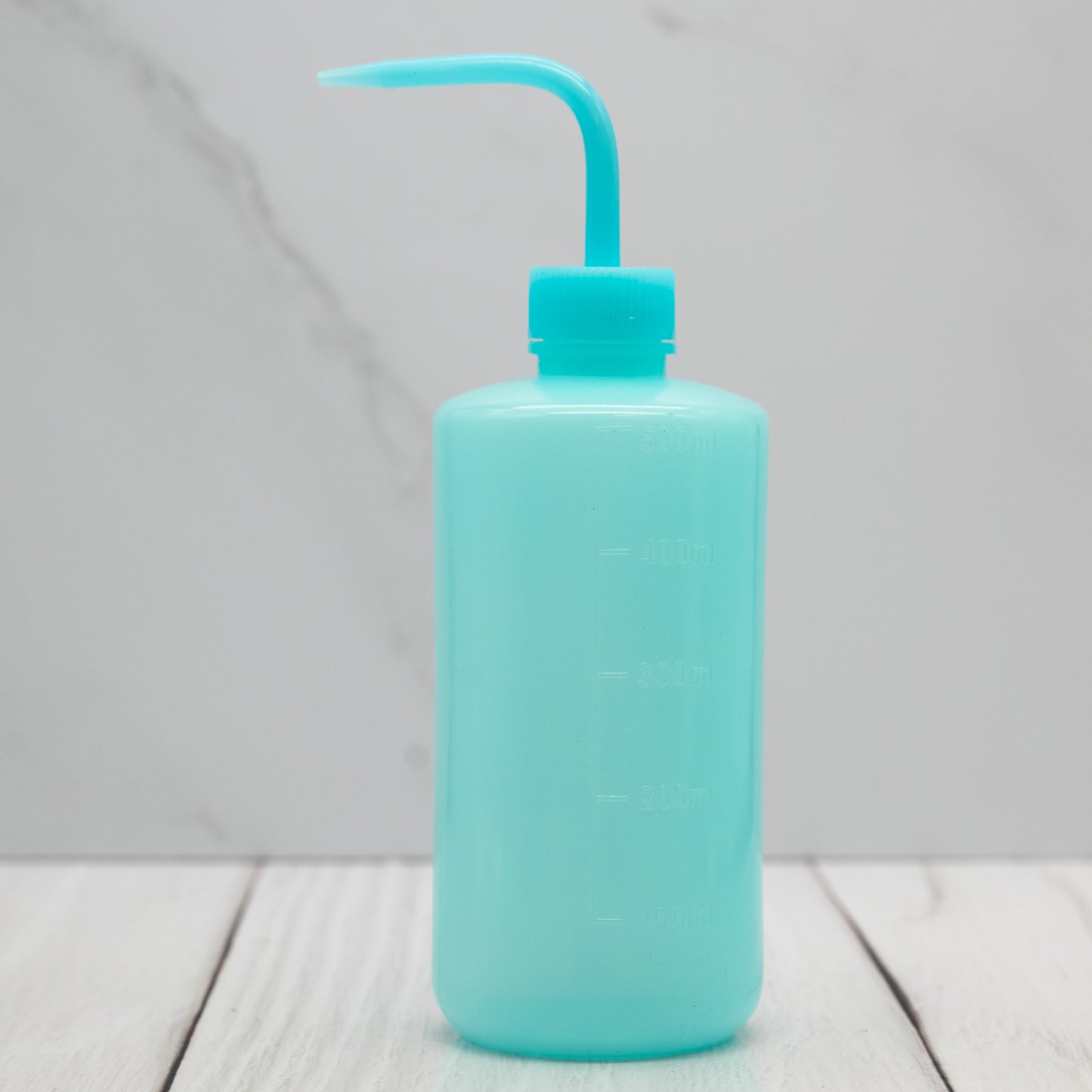 Squeeze Bottle with Curved Spout